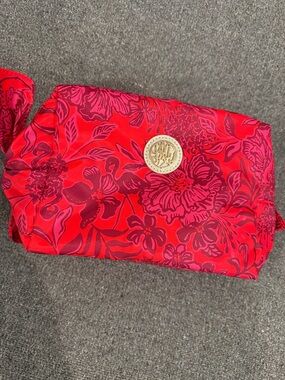 Lily Pulitzer Red Floral Cosmetic Pouch with Gold Medallion and Bow Detail